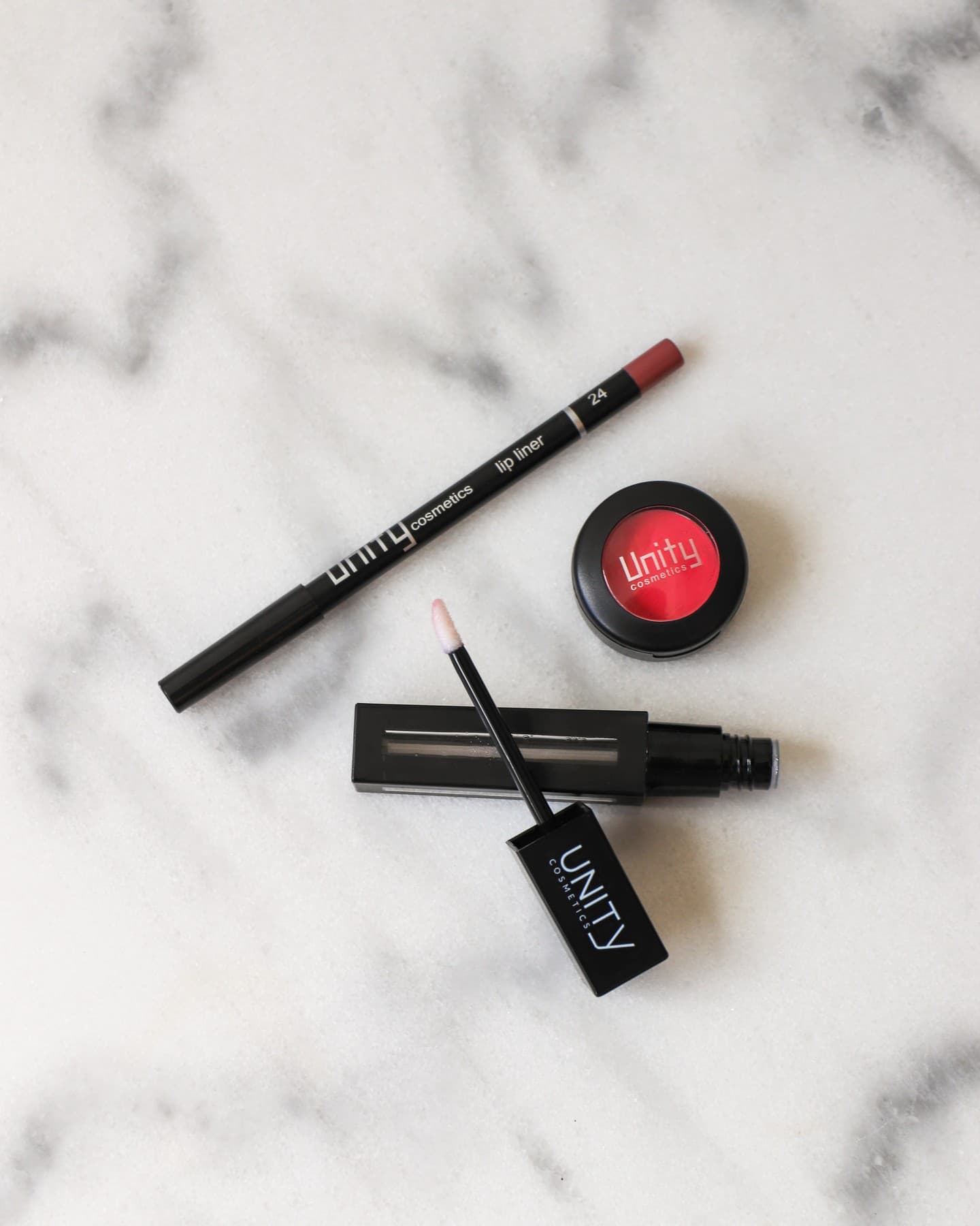 Unity Cosmetics product flat lay