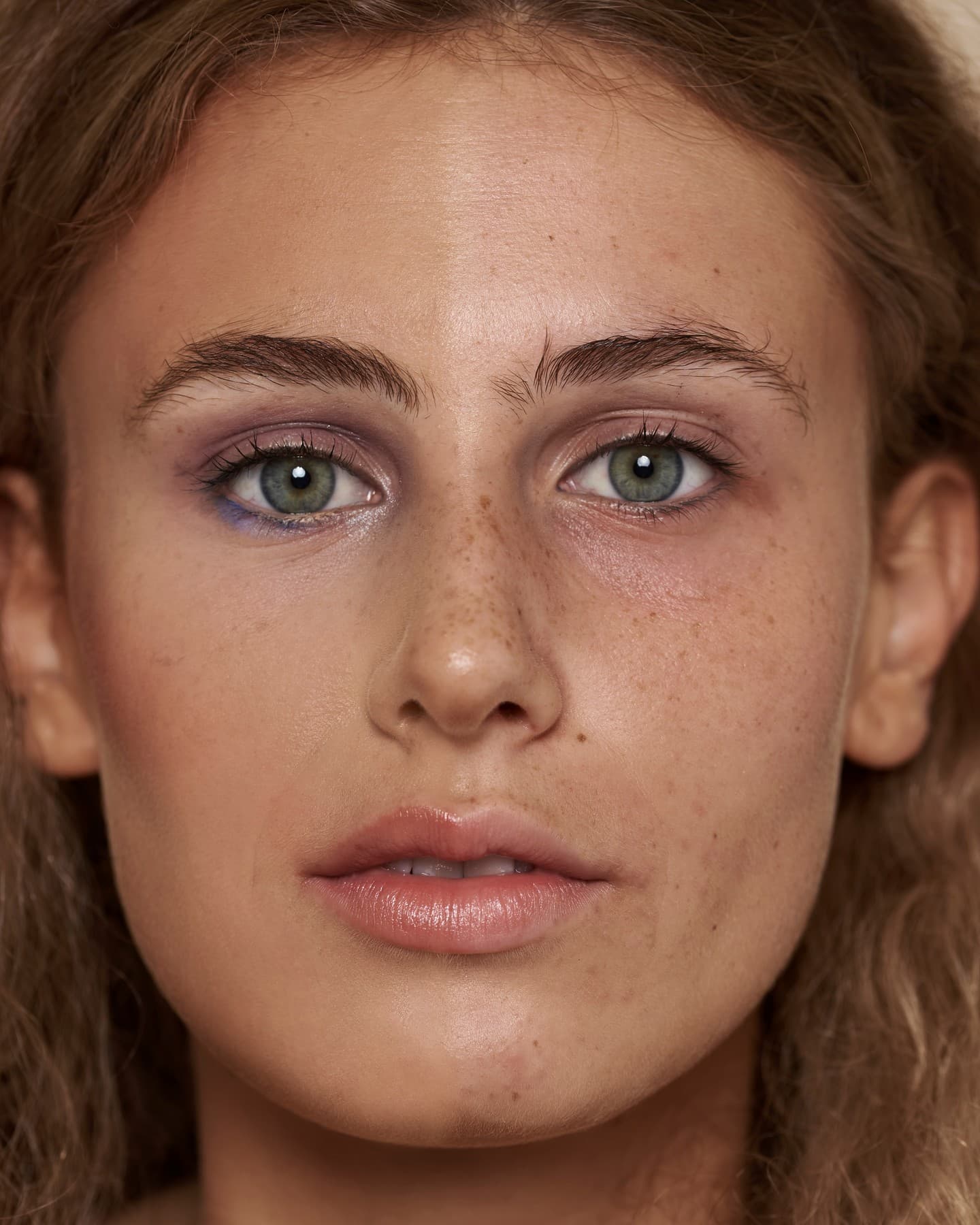Woman with healthy, radiant skin - Unity Cosmetics